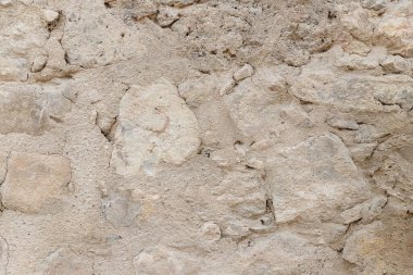 Duvarların ve surların eski yapılarının tipik taş duvar dokusu arka planı