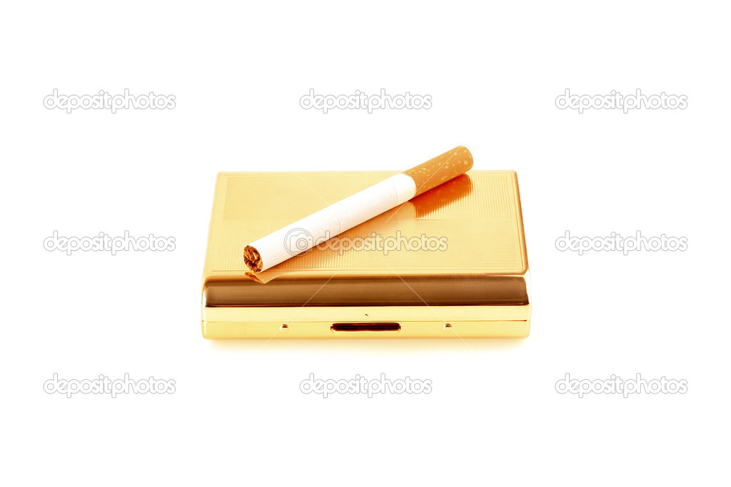 Gold cigarette-case with a cigarette on a white background
