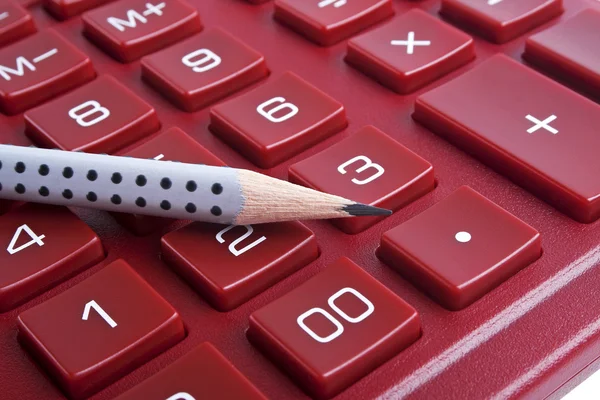 La calculadora y el lápiz, de cerca — Foto de Stock