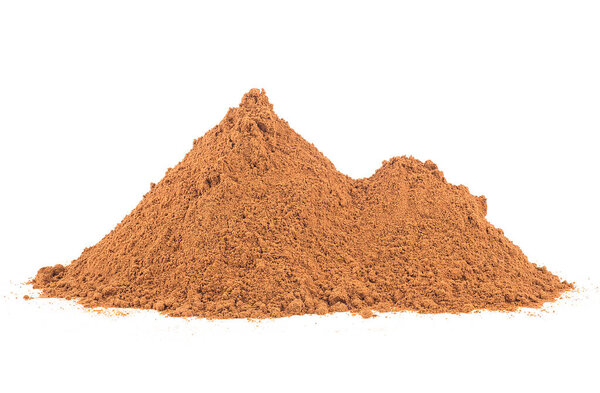 Cinnamon powder pile isolated on a white background. Heap of ground Cinnamon.
