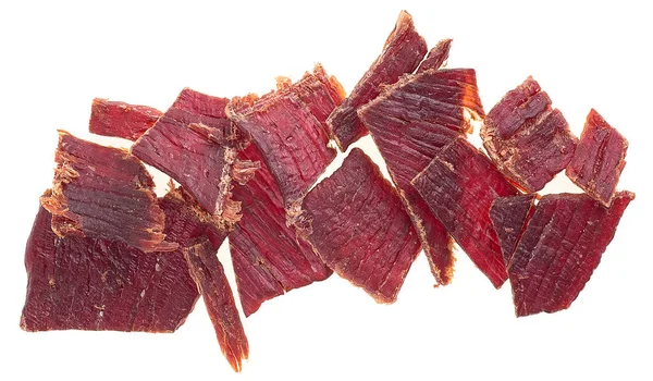 Часть Нарезанного Сушеного Мяса Изолирована Белом Фоне Вид Сверху Кусочки — стоковое фото