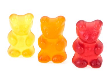 Colourful sweet gummy bears isolated on a white background. Three marmalade bears.