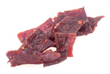 Dried and spicy jerky beef meat isolated on a white background