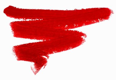 Red lipstick stroke isolated on a white background, top view. Lipstick smear smudge.