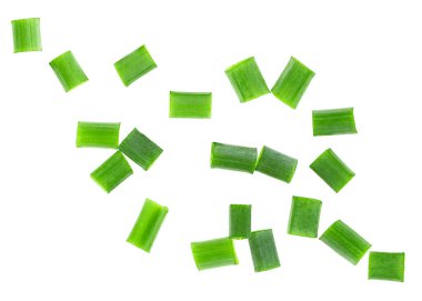 Chopped scallions isolated on a white background, top view.