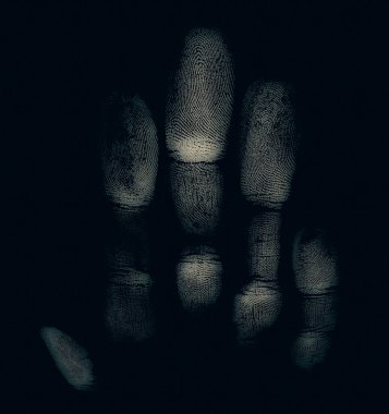 Imprint of hand on a dark background. Palm or hand print. Horror.