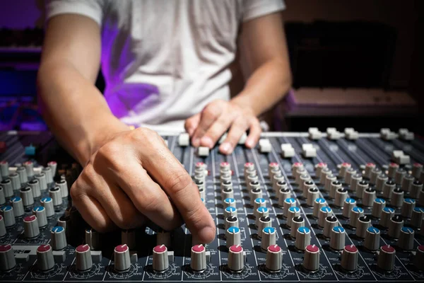 Sound Engineer Hand Adjusting Knobs Audio Mixing Console Recording Broadcasting Stock Photo