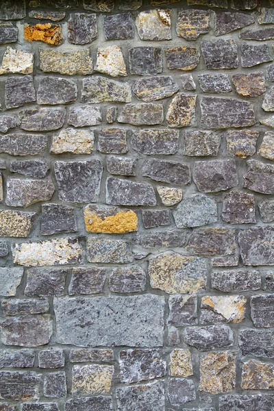 Baggrund Væg Tekstur af en gammel sektion facade - Stock-foto