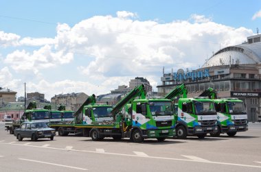 Moscow, russia, June, 12, 2014. Russian scene: Tow trucks while working in Moscow