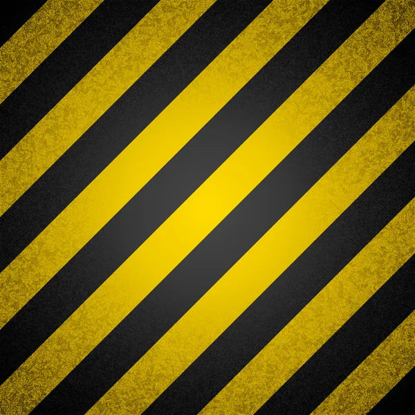 Vector background - black and yellow hazard stripes — Stock Vector