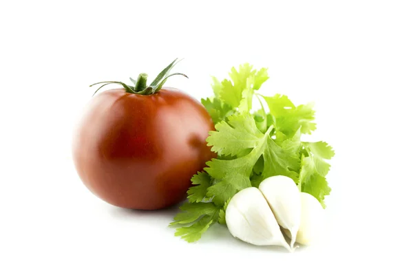 Čerstvá rajčata s česnekem a petrželkou — Stock fotografie