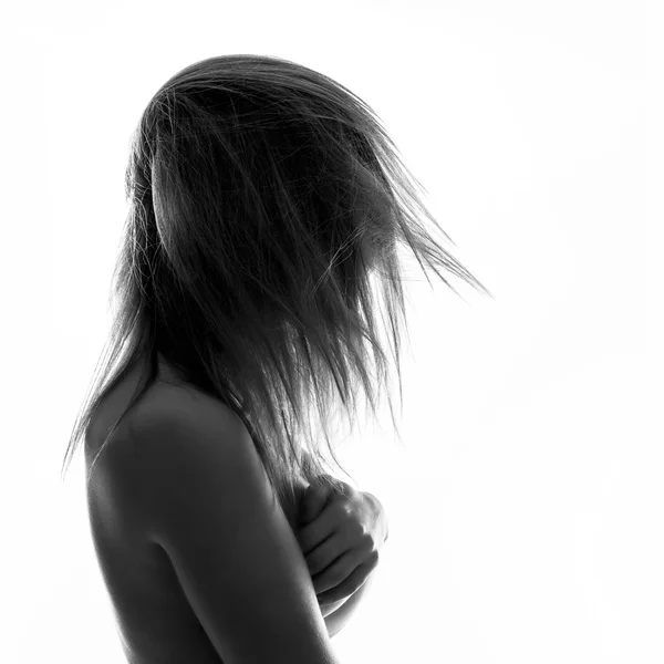 Isolated woman portrait in back light — Stock Photo, Image