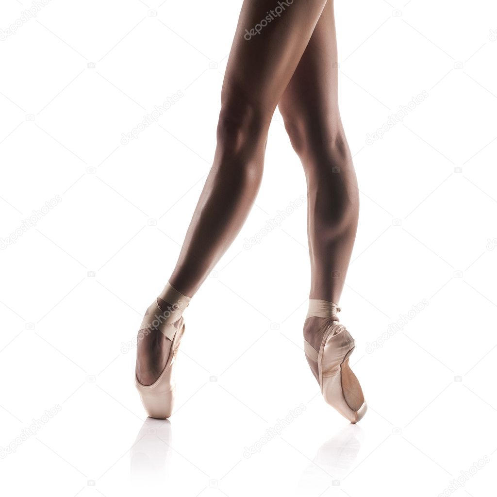 Beautiful ballet dancers legs isolated on white — Stock Photo © doodko