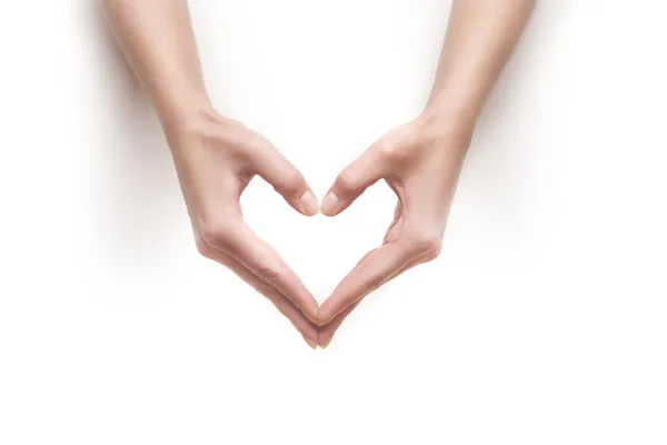 Woman hands show heart gesture — Stock Photo, Image