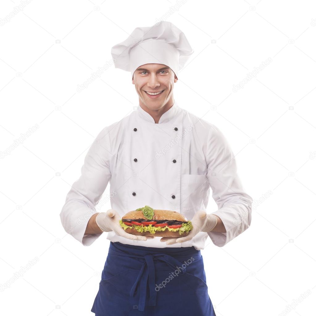 Chef holding a big sandwich
