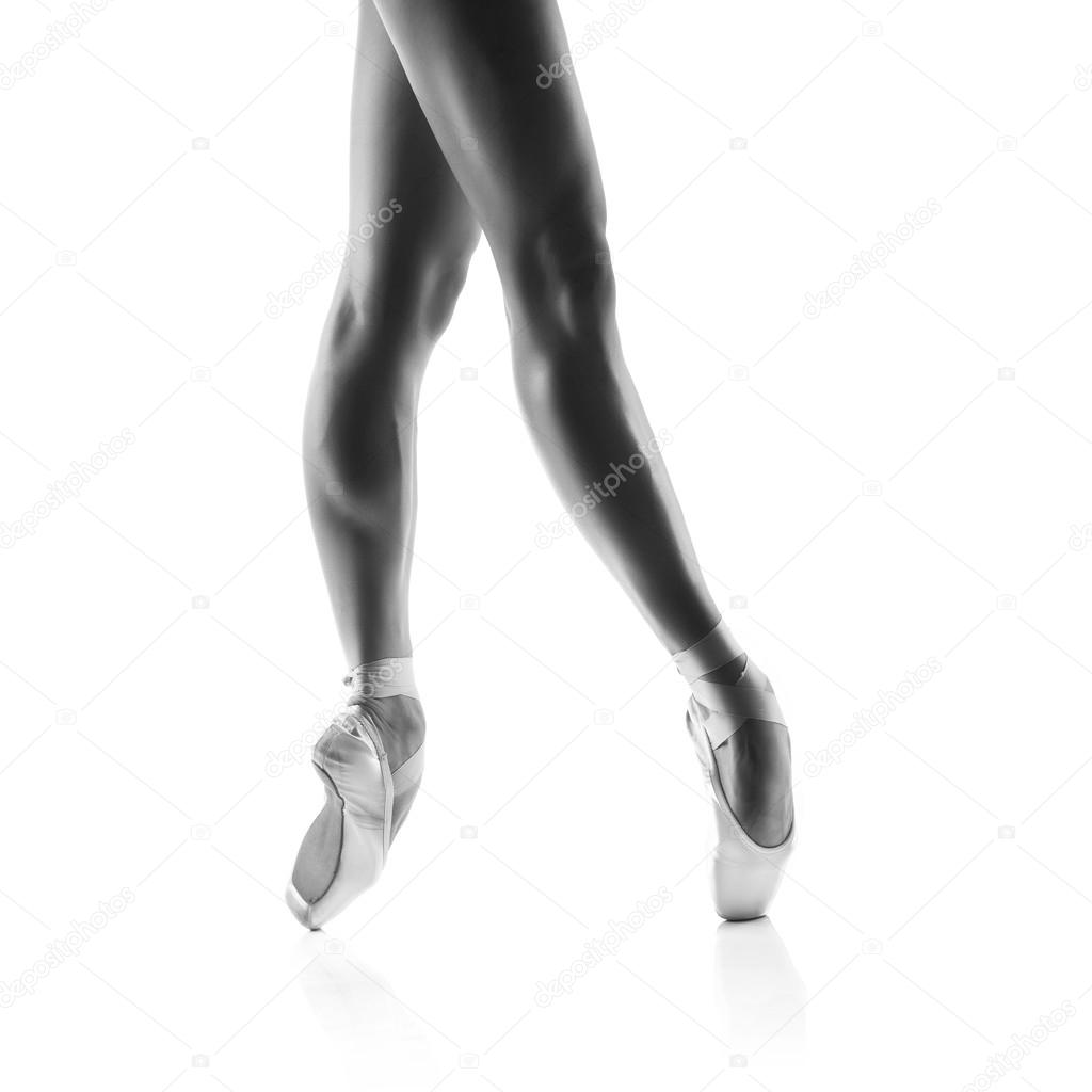 beautiful ballet dancers legs isolated on white