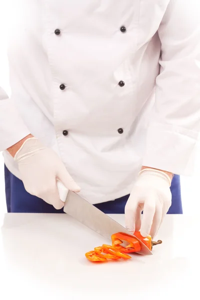 Chef-kok snijden paprika — Stockfoto