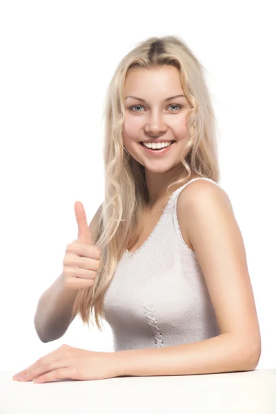 Attraktiv blond kvinna visar thumbsup — Stockfoto
