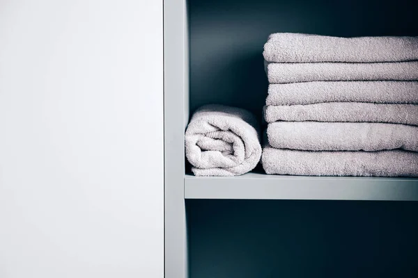 Stack of towels in the the shelf — Stock Photo, Image