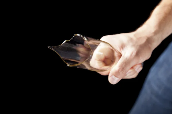 Broken beer bottle in hand — Stock Photo, Image