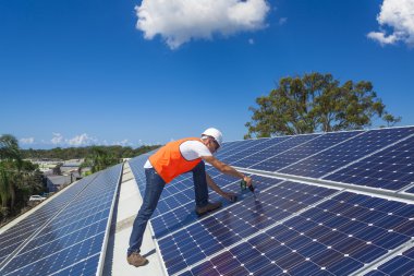 Solar panels with technician clipart