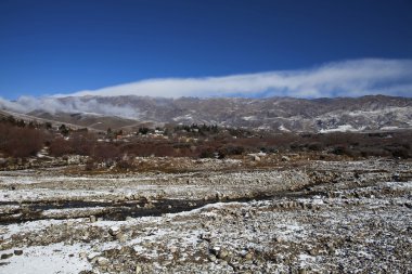 Snow in the valley around Tafi del Valle in Tucuman, North Argentina clipart