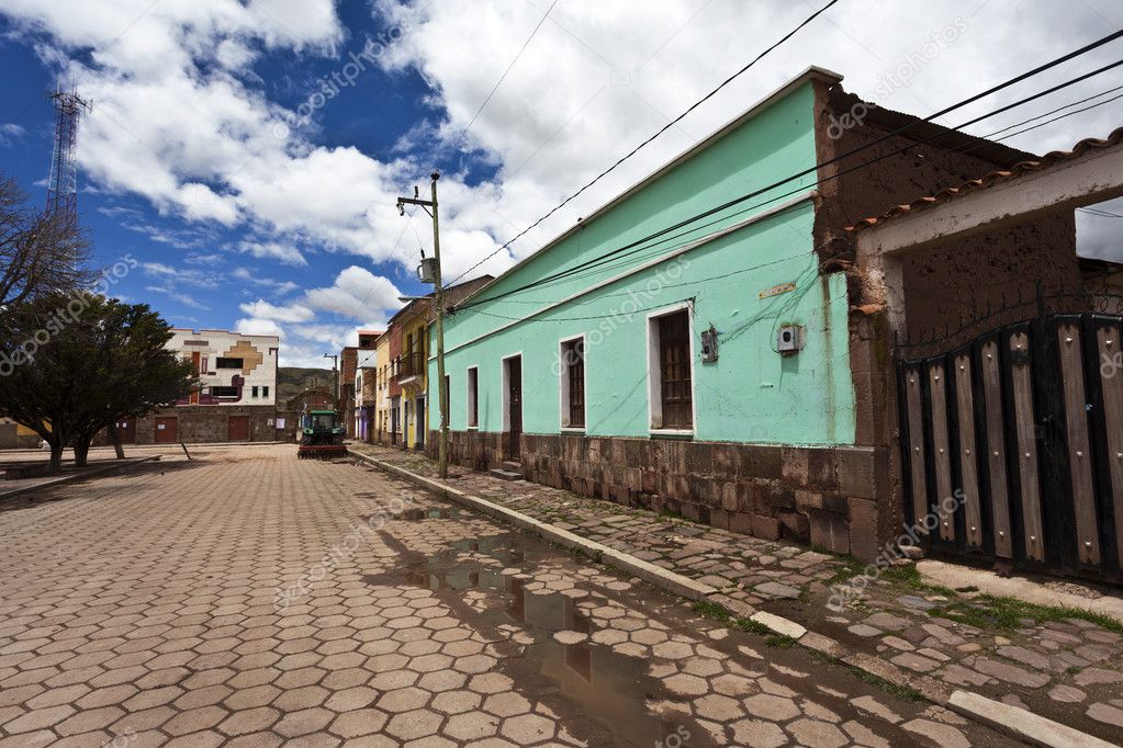 Colorful houses along the main square of Tiawanaku town in Bolivia - South America