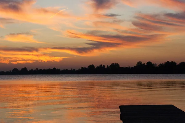 Orange sunset at the Westeinder Plassen lake in Aalsmeer - The Netherlands — Stock Photo, Image