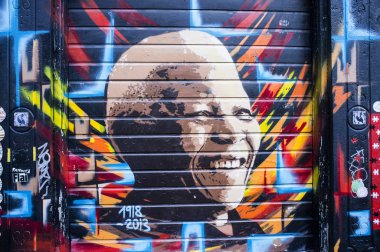 Graffity mural of Nelson Mandela in Amsterdam - The Netherlands clipart
