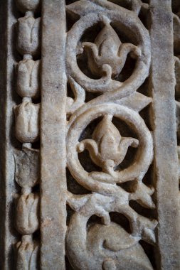 Marble column carved with a beautiful pattern in the Jain temple Adinatha temple in Ranakpur, Rajasthan, India, Asia