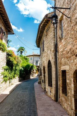 Facade of an old building in the historic center of Assisi, Umbria, Italy, Europe