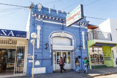 Local shopping street with an old pharmacy in the center of Villaguay, Entrerios, Argentina, South America