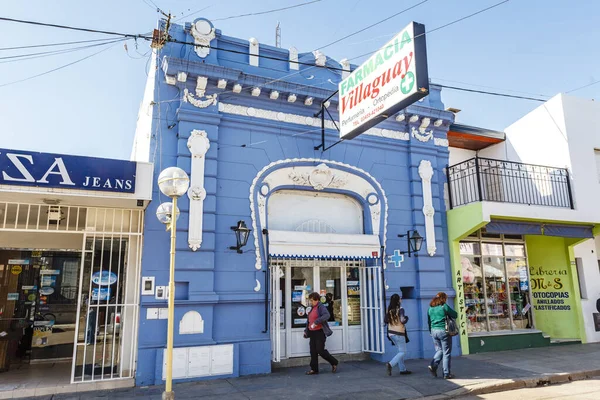 Local shopping street with an old pharmacy in the center of Villaguay, Entrerios, Argentina, South America