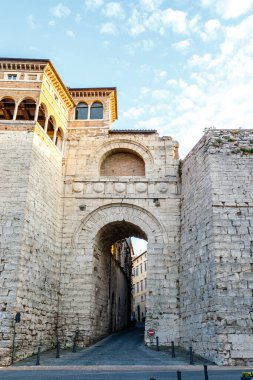 The Etruscan Arch or Arch of Augustus or Augustus Gate (with Augusta Perusia written on the facade) is one of eight gates in the Etruscan wall of Perusia, known today as Perugia in Umbria, Italy, Europe.