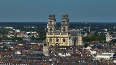 Aerial view of Paris suburb French city of Orleans. Roofs of medieval houses of the historical city. City center with beautiful houses and a church. High quality 4k footage