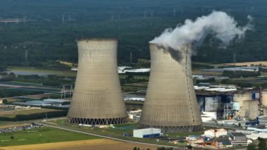 Aerial view to nuclear power plant in France. Atomic power stations are very important sources of electricity with low carbon footprint. Aerial view to big source of emissions in European Union.
