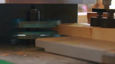 Carpenter in the workshop, works with wood, makes furniture parts in natural light. Carpentry tools. High quality 4k footage