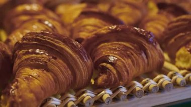 Puff pastry, croissants, puffs. Food industry, confectionery, bakery. Knead, roll out the dough at a large production. High quality 4k footage