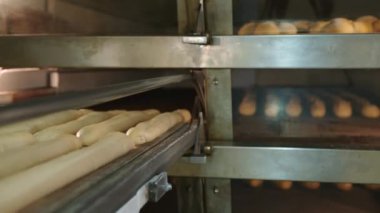Kneading Dough. Baker preparing the dough for bread. Manufacture of bakery products. The baker is making dough products. High quality 4k footage
