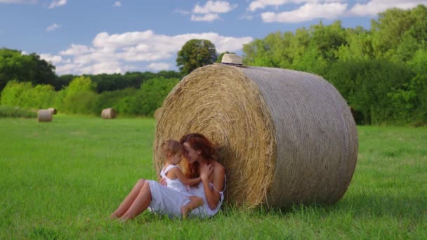 Mom Daughter White Dresses Field Straw Stacks Stack Bales Hay — Stockvideo