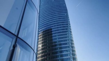 Modern office high rise skyscraper buildings. City business district. Looking up at business buildings. Low angle view of business buildings. Paris France. High quality 4k footage
