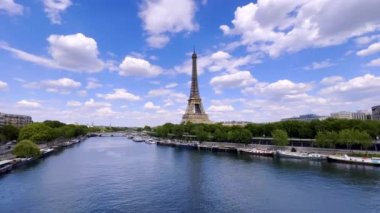 FRANCE, PARIS: Eiffel Tower in the morning time and summertime in Paris, France, horizontal pan. High quality 4k footage
