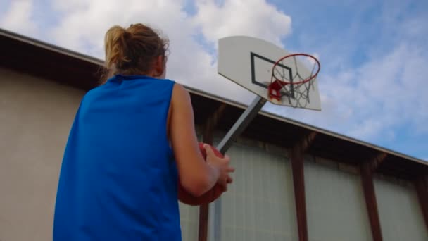 Boy Blue Basketball Uniform Plays Orange Ball Basketball Training School — Stockvideo