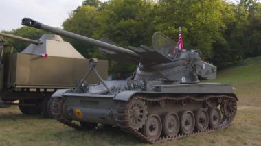 American military tank. American flag on military equipment. USA military equipment at the exhibition of old army weapons of the 20th century. High quality 4k footage
