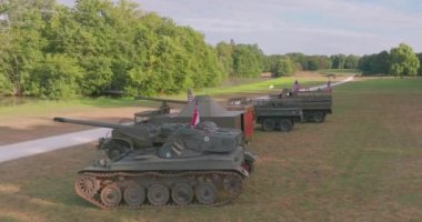 American military truck. American flag on military equipment. USA military equipment at the exhibition of old army weapons of the 20th century. High quality 4k footage