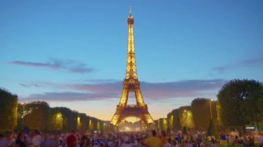 Eiffel tower, Paris, France, timelapse. Champ de Mars and the Eiffel Tower timelapse in a sunny summer day. Paris, France. High quality 4k footage