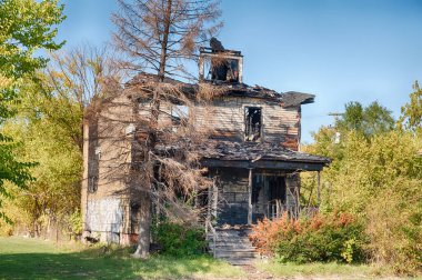 Detroit 'in Highland Park mahallesindeki yanmış bir ev, şehri etkileyen şehir hastalığını gösteriyor..