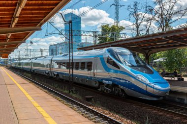 Gdansk, Poland - August 6, 2022: Modern high speed train Pendolino stopped at the station Gdansk Oliwa.