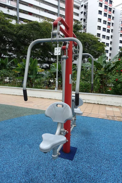 Exercise equipment in the public housing area.