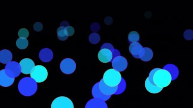 Abstract blue bubbles background.Bokeh night tone motion.Celebration background concept